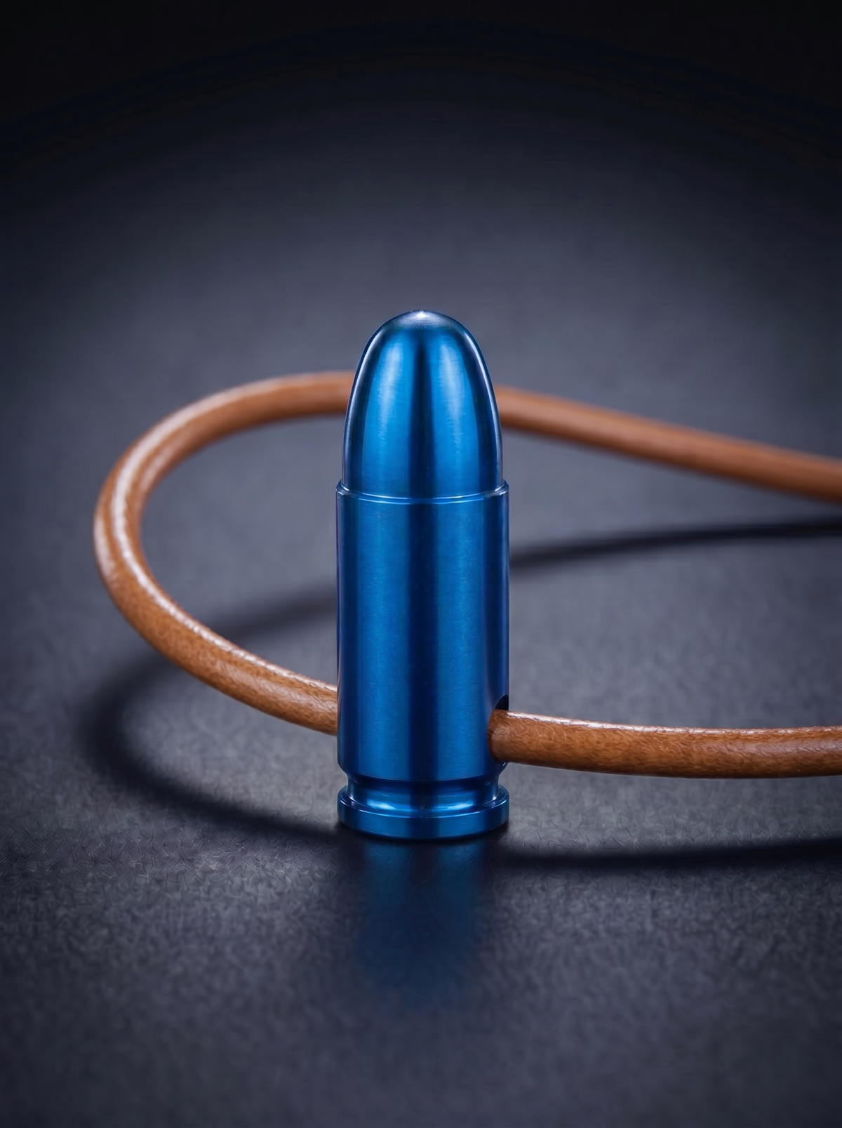 Blue titanium pistol cartridge pendant on original leather cord