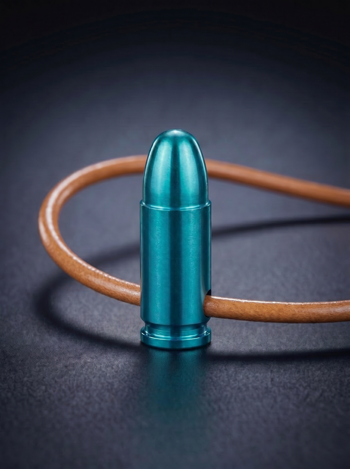 Green titanium pistol cartridge pendant on original leather cord