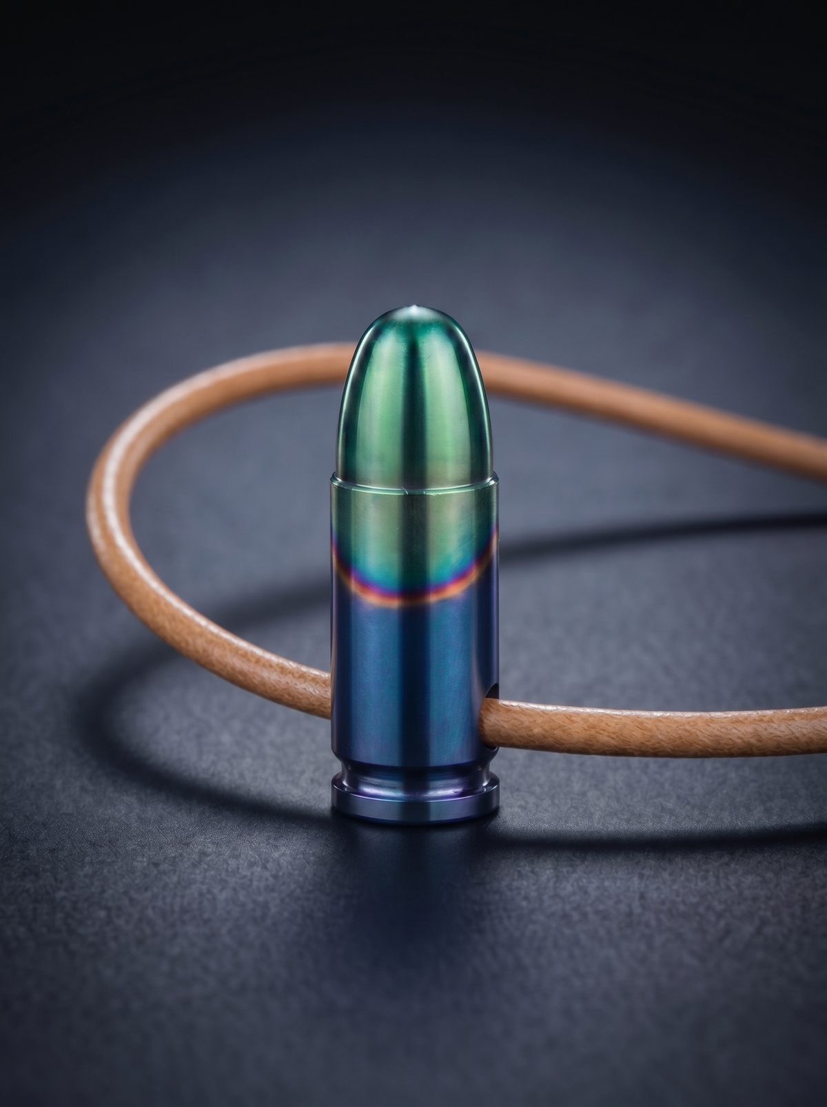 Multishade pistol cartridge pendant on original leather cord
