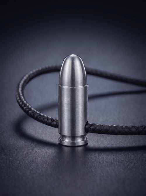 Natural titanium pistol cartridge pendant on nappa leather cord