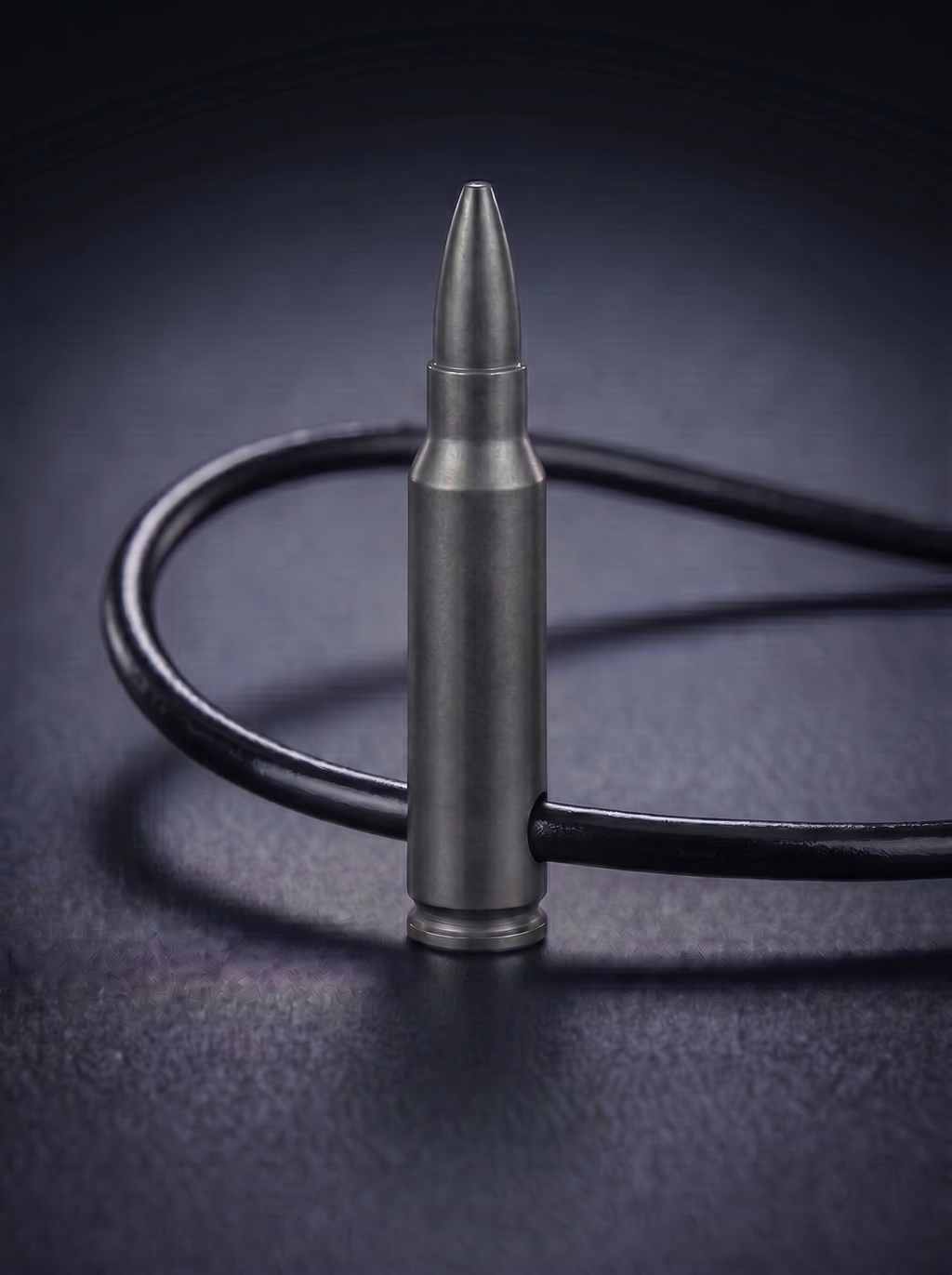Black titanium rifle cartridge pendant on black leather cord