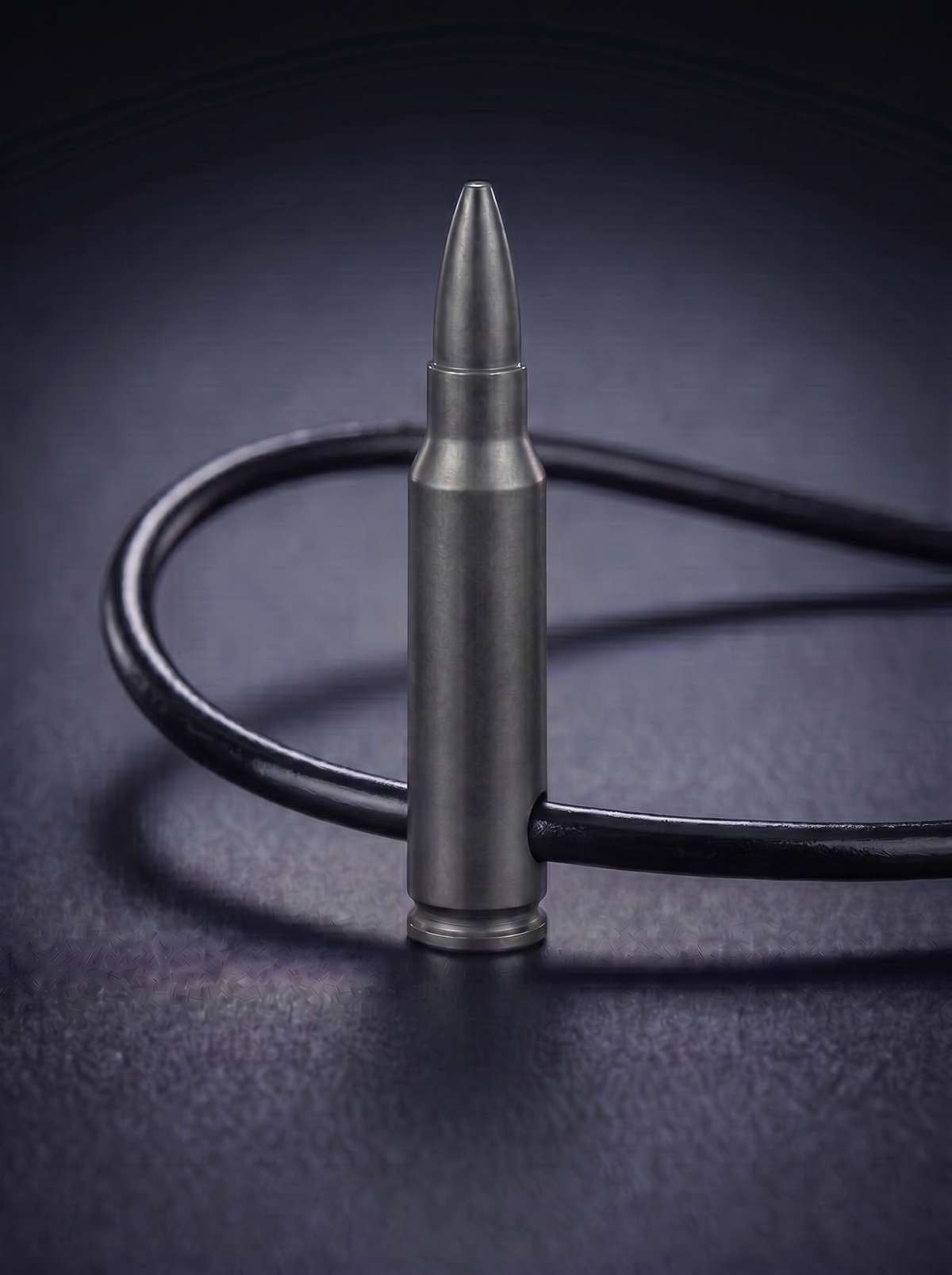 Black titanium rifle cartridge pendant on black leather cord