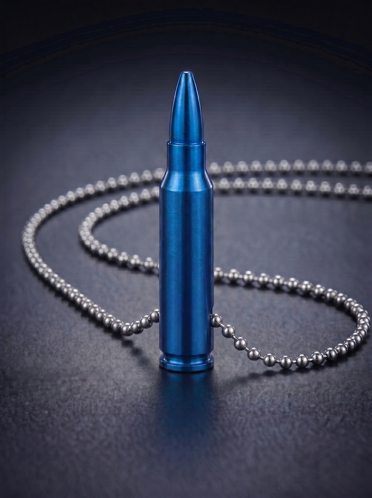 Blue titanium rifle cartridge pendant on ball chain